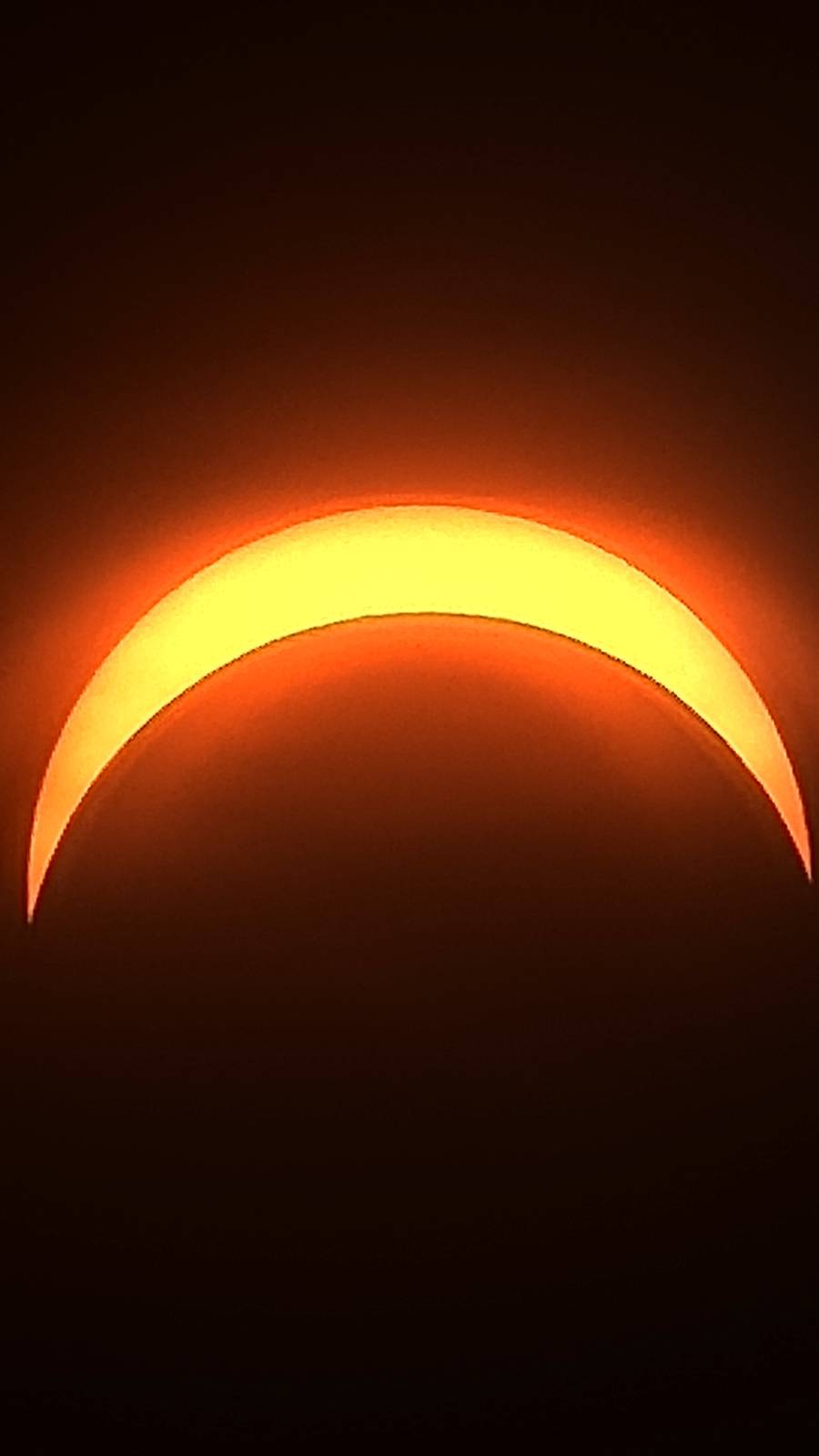 The Moon passing in front of the Sun during a partial solar eclipse